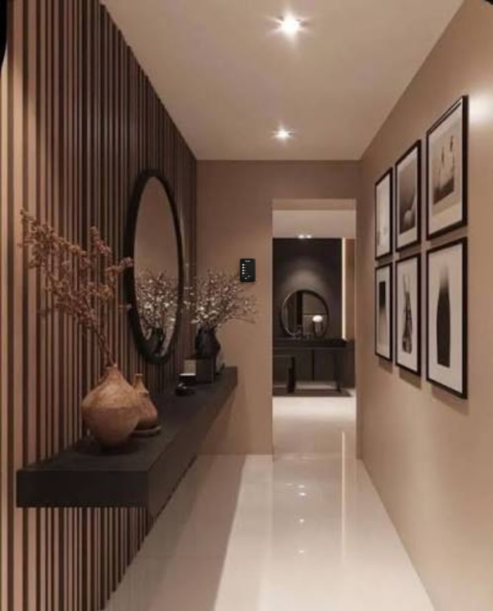 RentalOS kiosk mounted beside the doorway of an elegant beige hallway